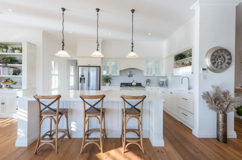 White French colonial style kitchen with timber bar stools at Marionberry Lane