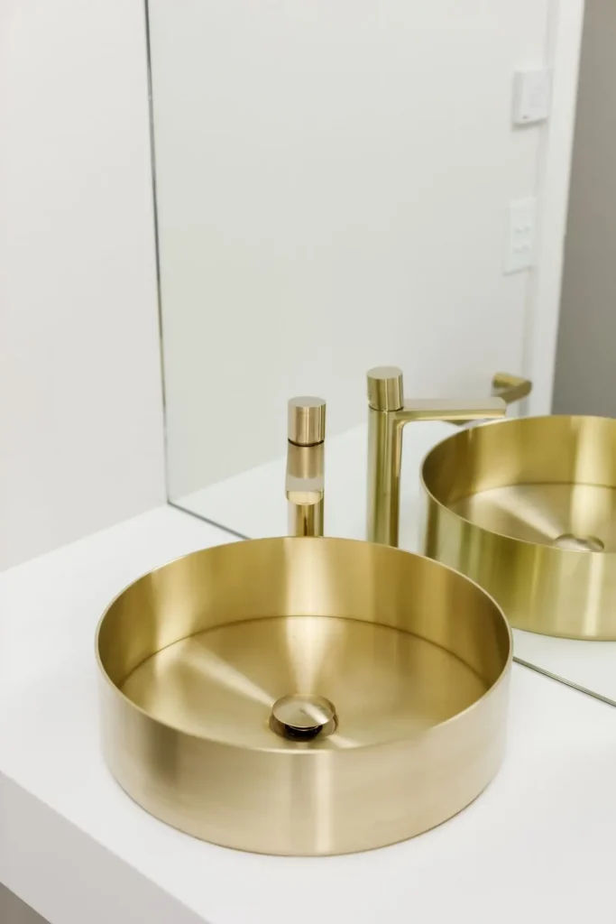 Brass basin and tapware in a Redvale Estate bathroom
