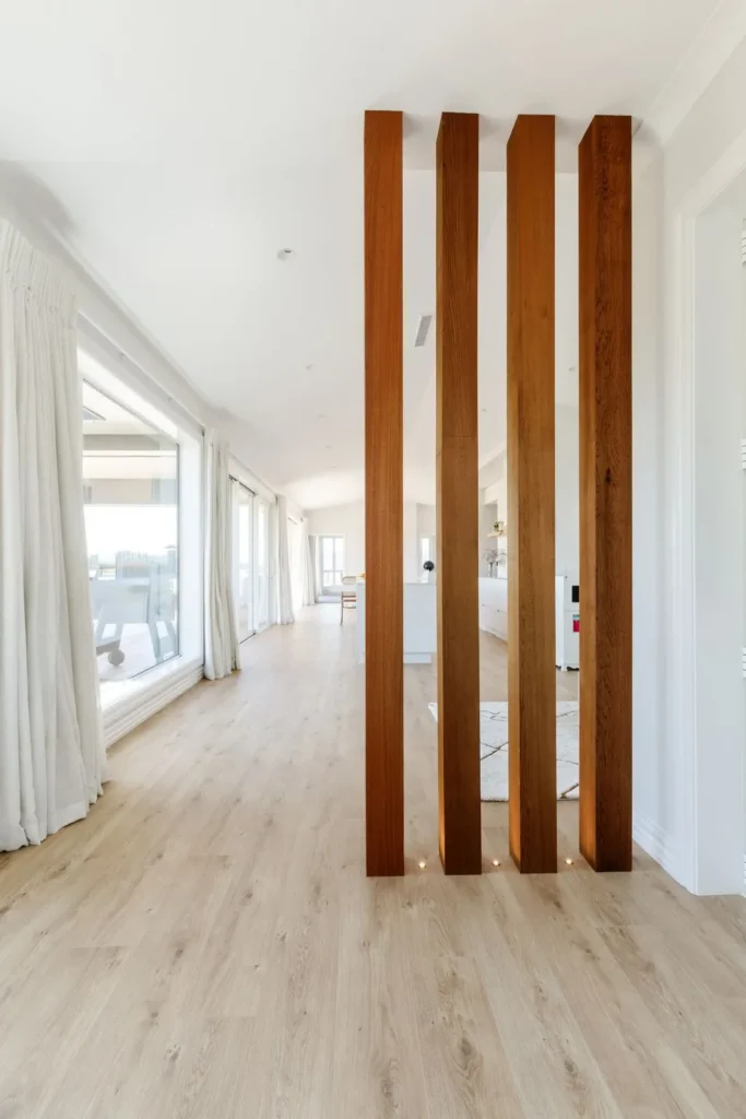 Timber batten screen in the hallway at Redvale Estate