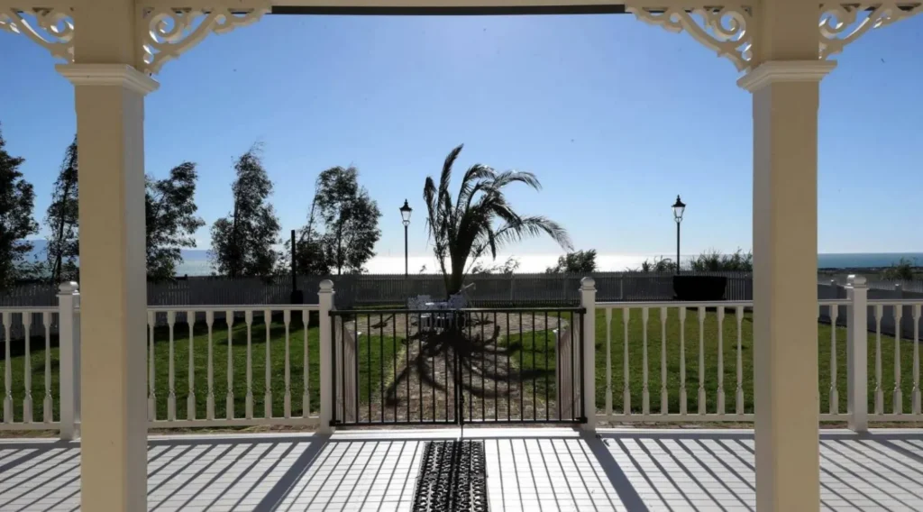 View from the veranda with timber fretwork at Wakapuaka